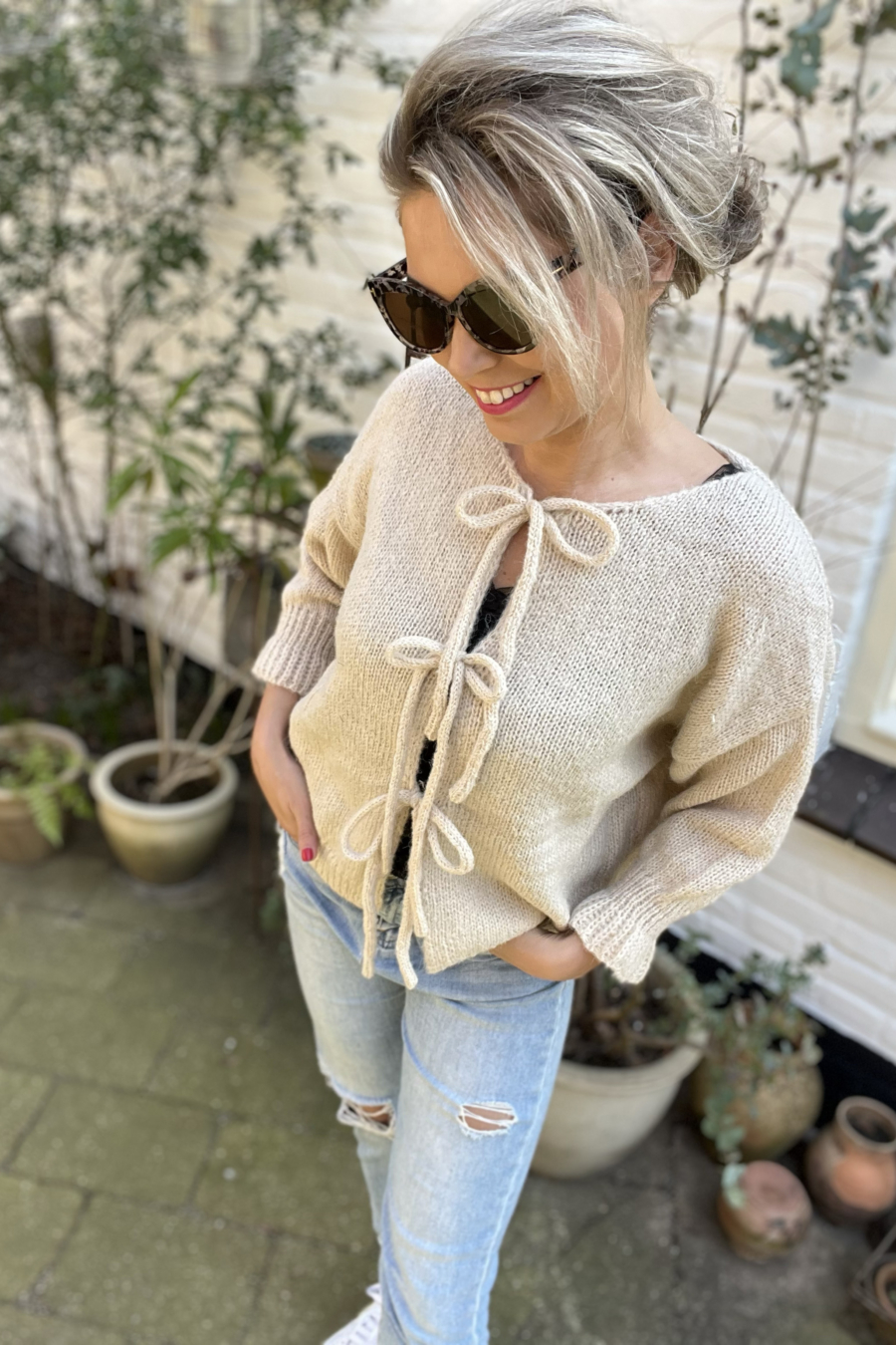 beige strikjesvest